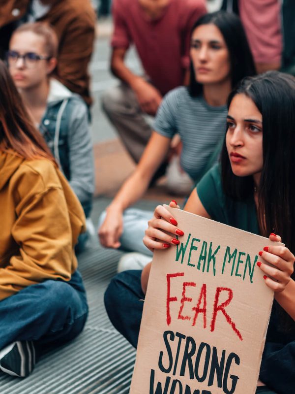 young-crowd-sitting-on-street-protesting-for-gende-2023-03-17-18-22-21-utc.jpg